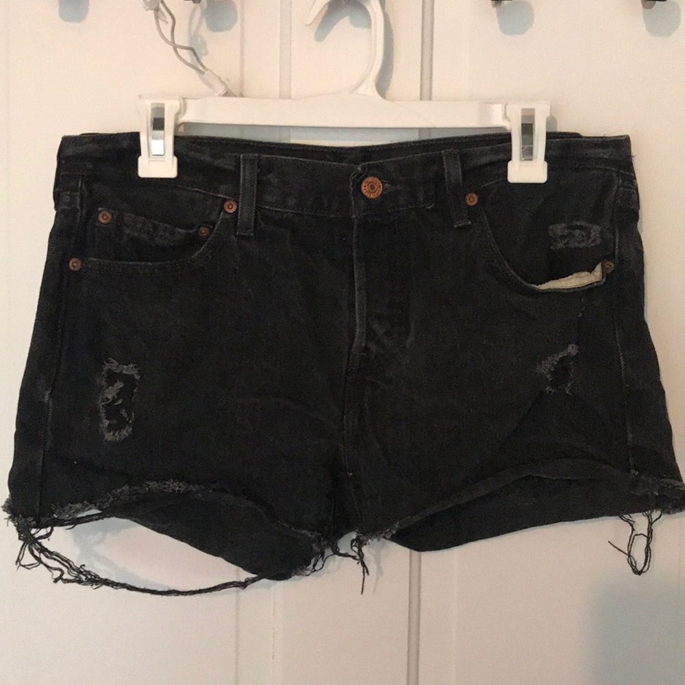 Levi’s black denim distressed shorts festival wear